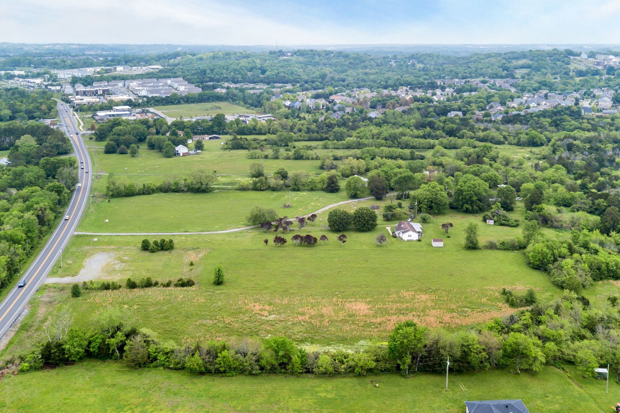 0 Nolensville Road Brentwood, TN 37027 - Photo 8 of 27 an aerial view of a houses with outdoor space and trees all around