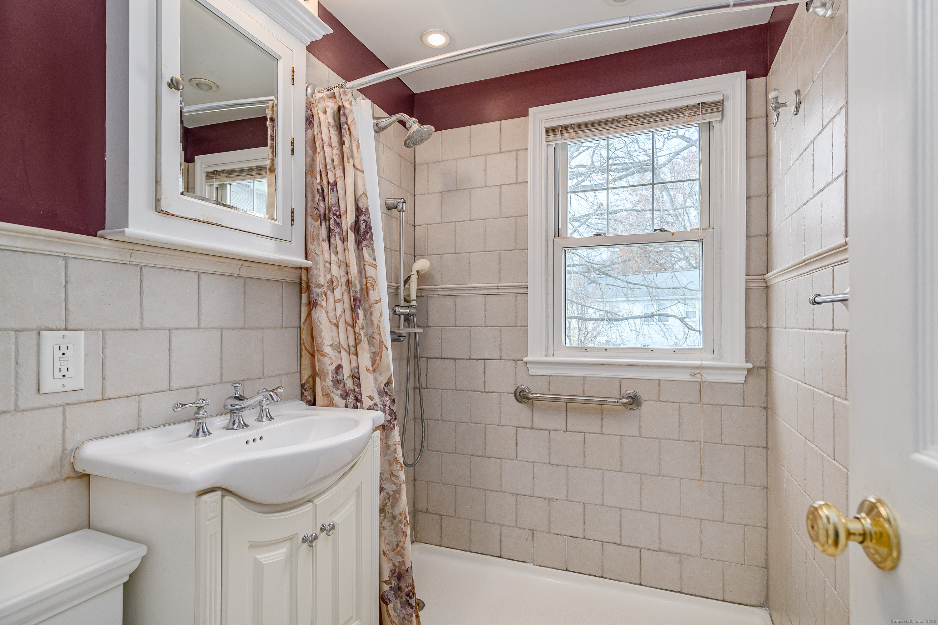 114 Sylvan Knoll Road Stamford, CT 06902 - Photo 11 of 23 a bathroom with a sink a toilet and shower