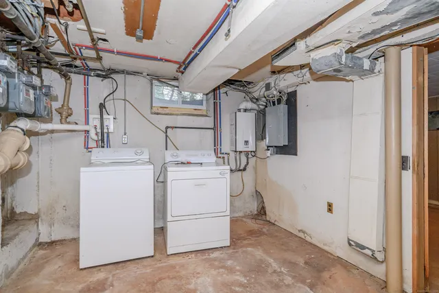a utility room with dryer and washer