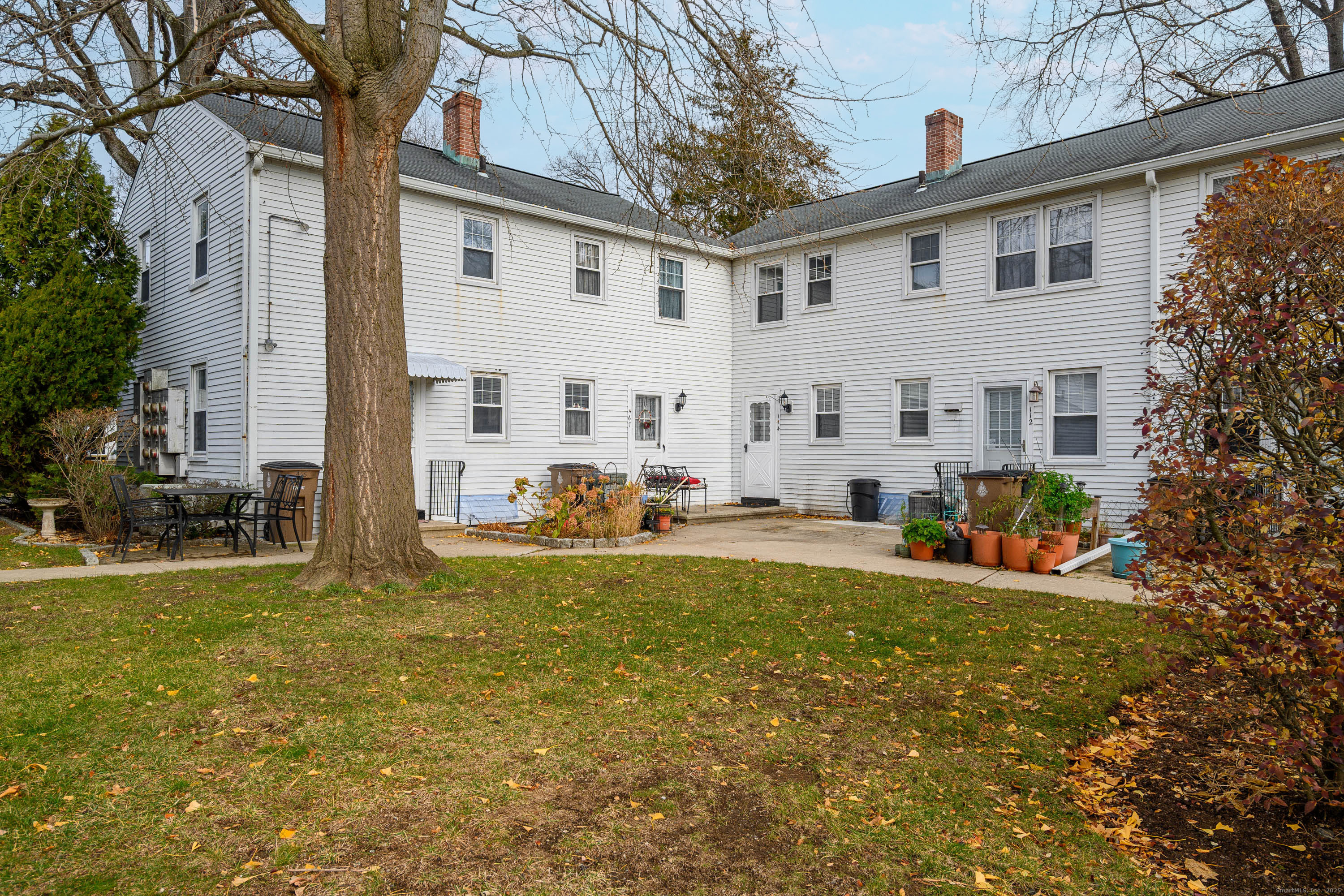 114 Sylvan Knoll Road Stamford, CT 06902 - Photo 18 of 23 a view of a house with backyard and sitting area