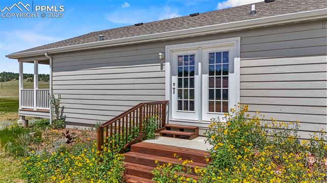 567 High Pasture Road Florissant, CO 80816 - Photo 39 of 48 View of side entry into kitchen/dining