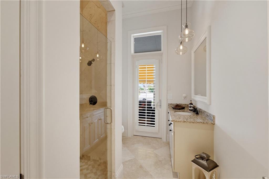 361 Pirates Bight Naples, FL 34103 - Photo 19 of 45 a bathroom with a shower