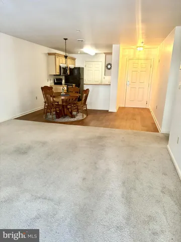 a view of a kitchen and a window