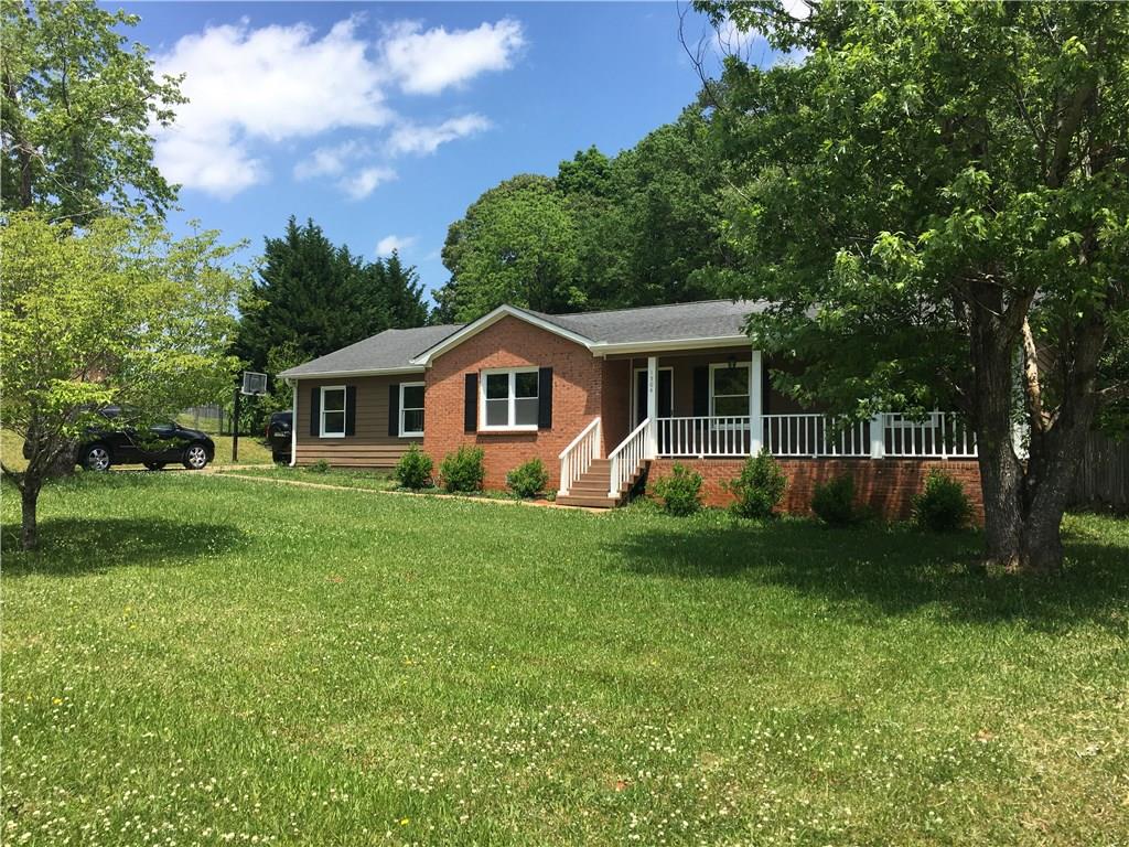 1504 Betts Mill Road Auburn, GA 30011 - Photo 1 of 1 Beautiful Rocking Chair Front Porch