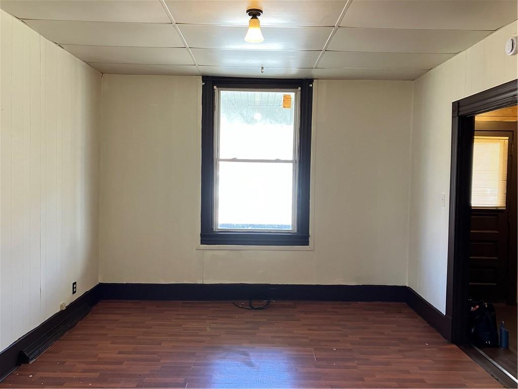 400 3rd Street Butler, PA 16001 - Photo 3 of 19 an empty room with wooden floor and windows