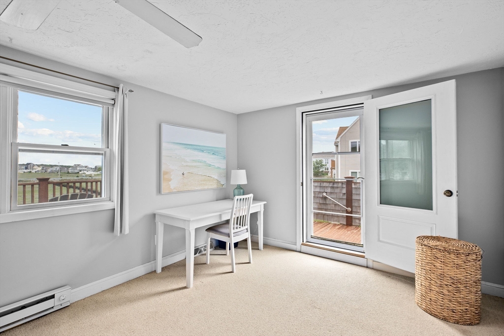 8 Cliff Estates Road, Unit 8 Scituate, MA 02066 - Photo 20 of 36 a workspace with furniture and window