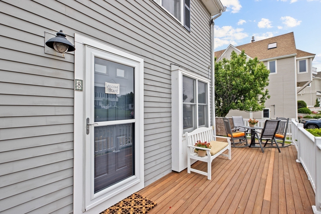 8 Cliff Estates Road, Unit 8 Scituate, MA 02066 - Photo 25 of 36 a balcony view with a seating space