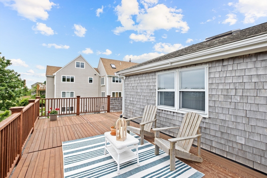 8 Cliff Estates Road, Unit 8 Scituate, MA 02066 - Photo 29 of 36 a view of a chairs on the roof deck