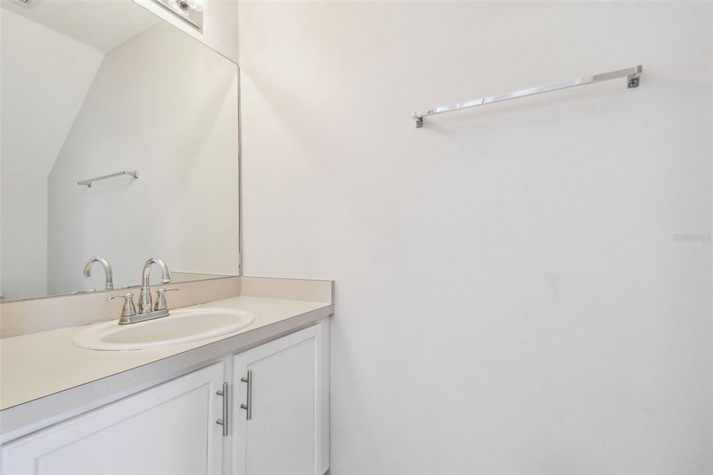 16227 Swan View Circle Odessa, FL 33556 - Photo 11 of 29 a bathroom with a sink and a mirror