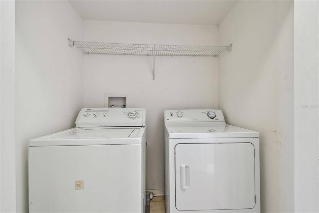 16227 Swan View Circle Odessa, FL 33556 - Photo 12 of 29 a utility room with dryer and washer