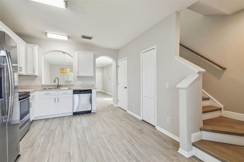 16227 Swan View Circle Odessa, FL 33556 - Photo 10 of 29 a large kitchen with a lot of counter space and stainless steel appliances