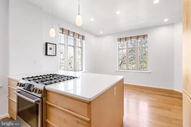 a view of a glass door with a yard