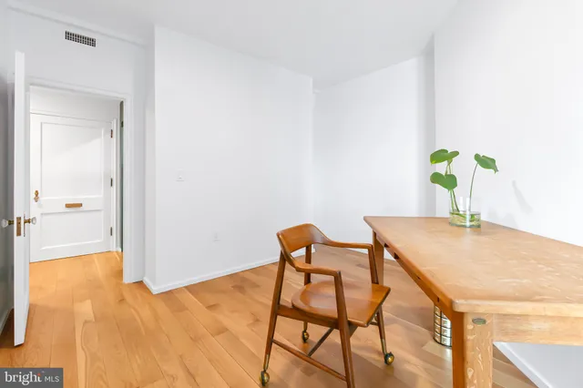 a workspace with furniture and window