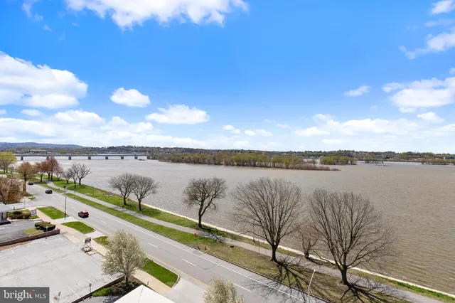 a view of a lake with a big yard