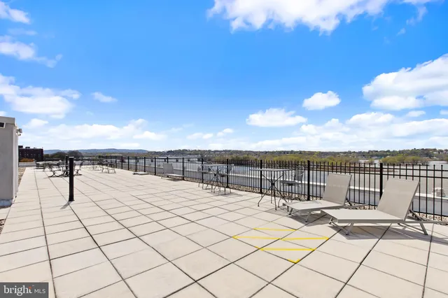 a kitchen with a sink and a refrigerator