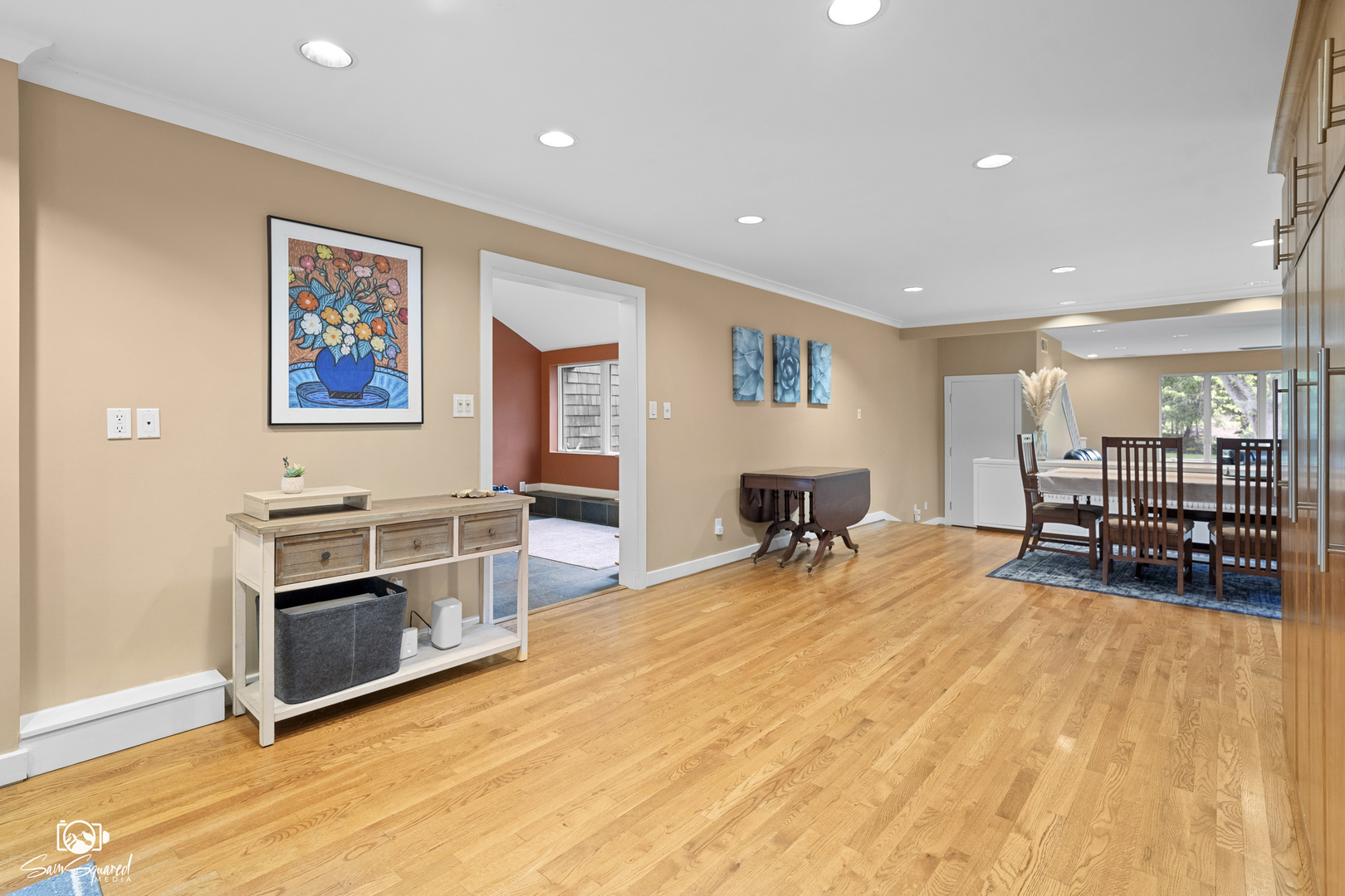 1886 Springview Drive Kankakee, IL 60901 - Photo 14 of 42 a living room with furniture a table and chairs next to a large window