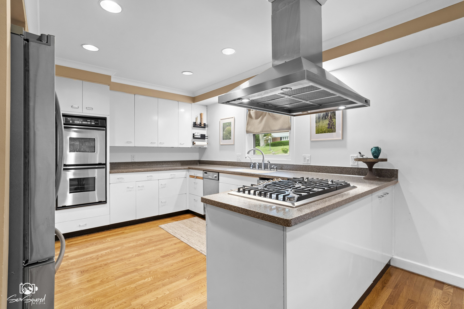 1886 Springview Drive Kankakee, IL 60901 - Photo 17 of 42 a kitchen with stainless steel appliances granite countertop a stove and a sink