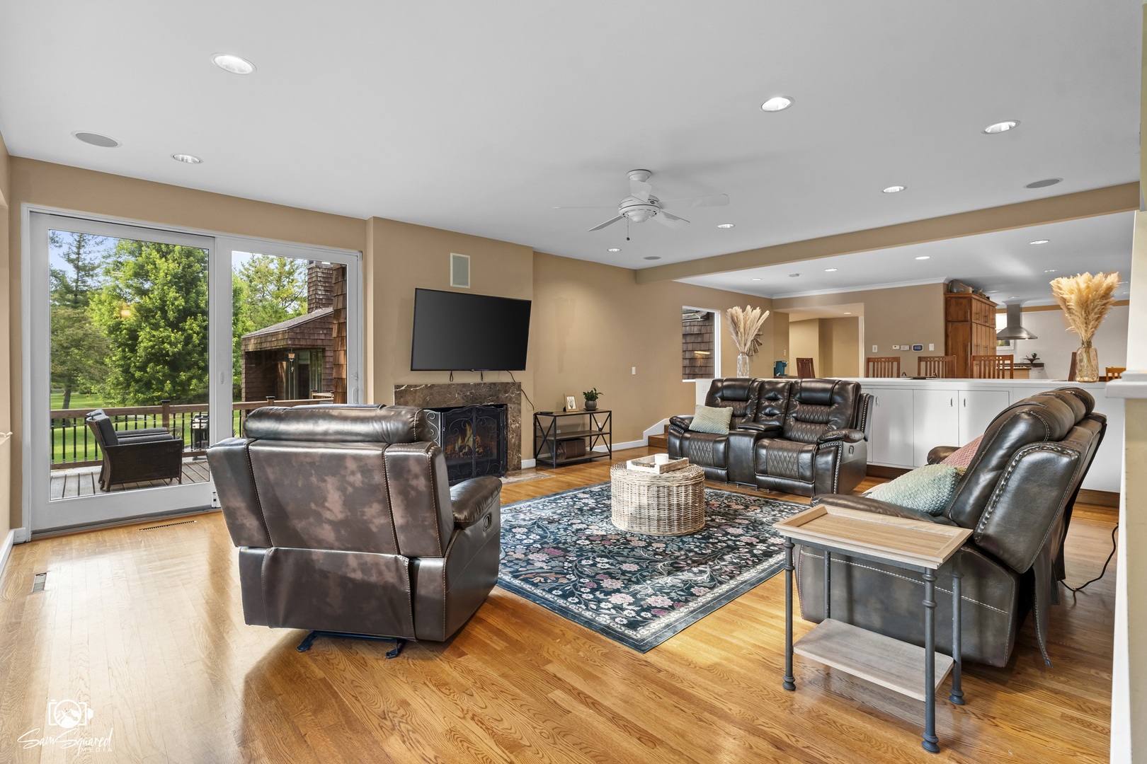 1886 Springview Drive Kankakee, IL 60901 - Photo 26 of 42 a living room with furniture and a flat screen tv