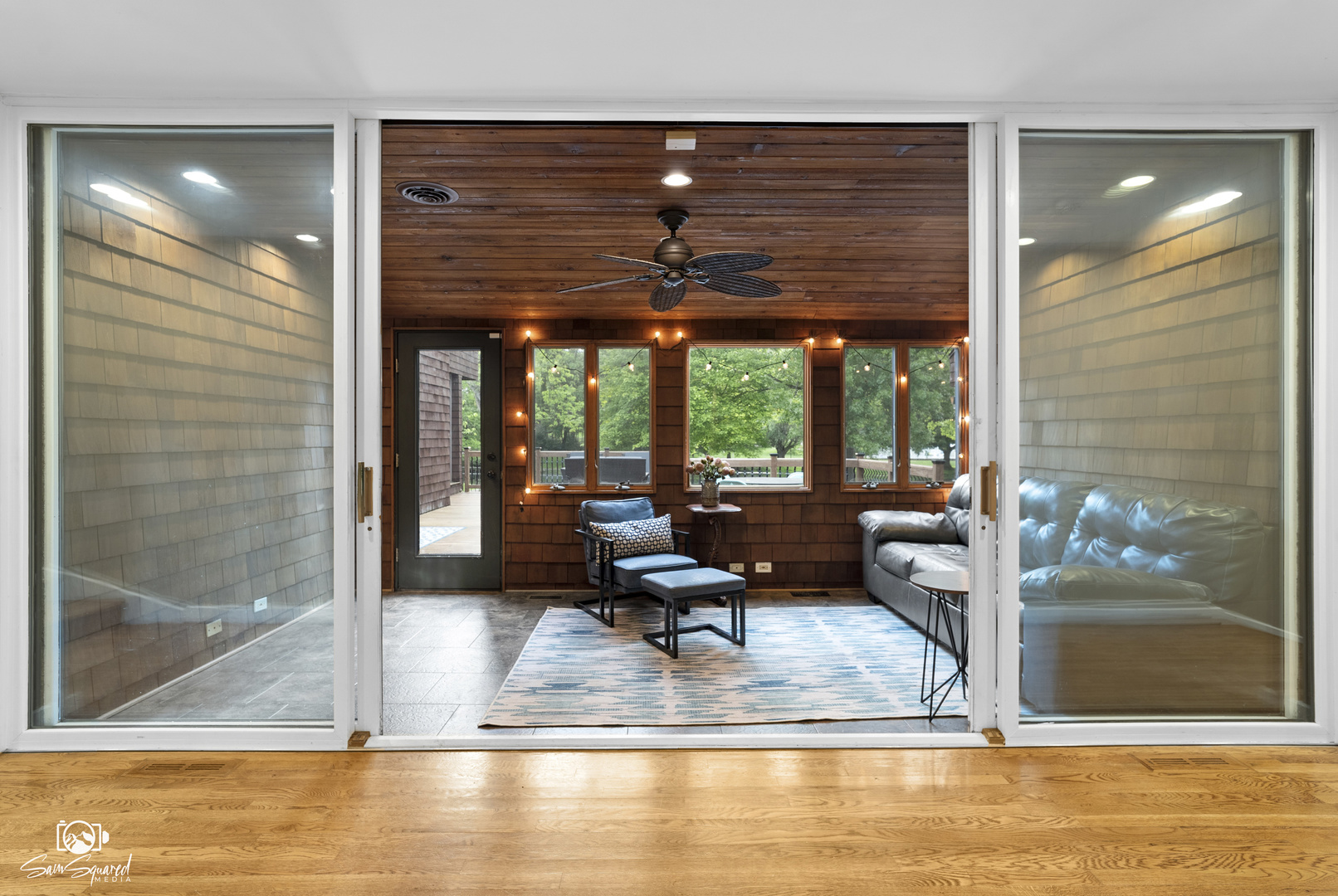 1886 Springview Drive Kankakee, IL 60901 - Photo 29 of 42 a living room with a floor to ceiling window and wooden floor