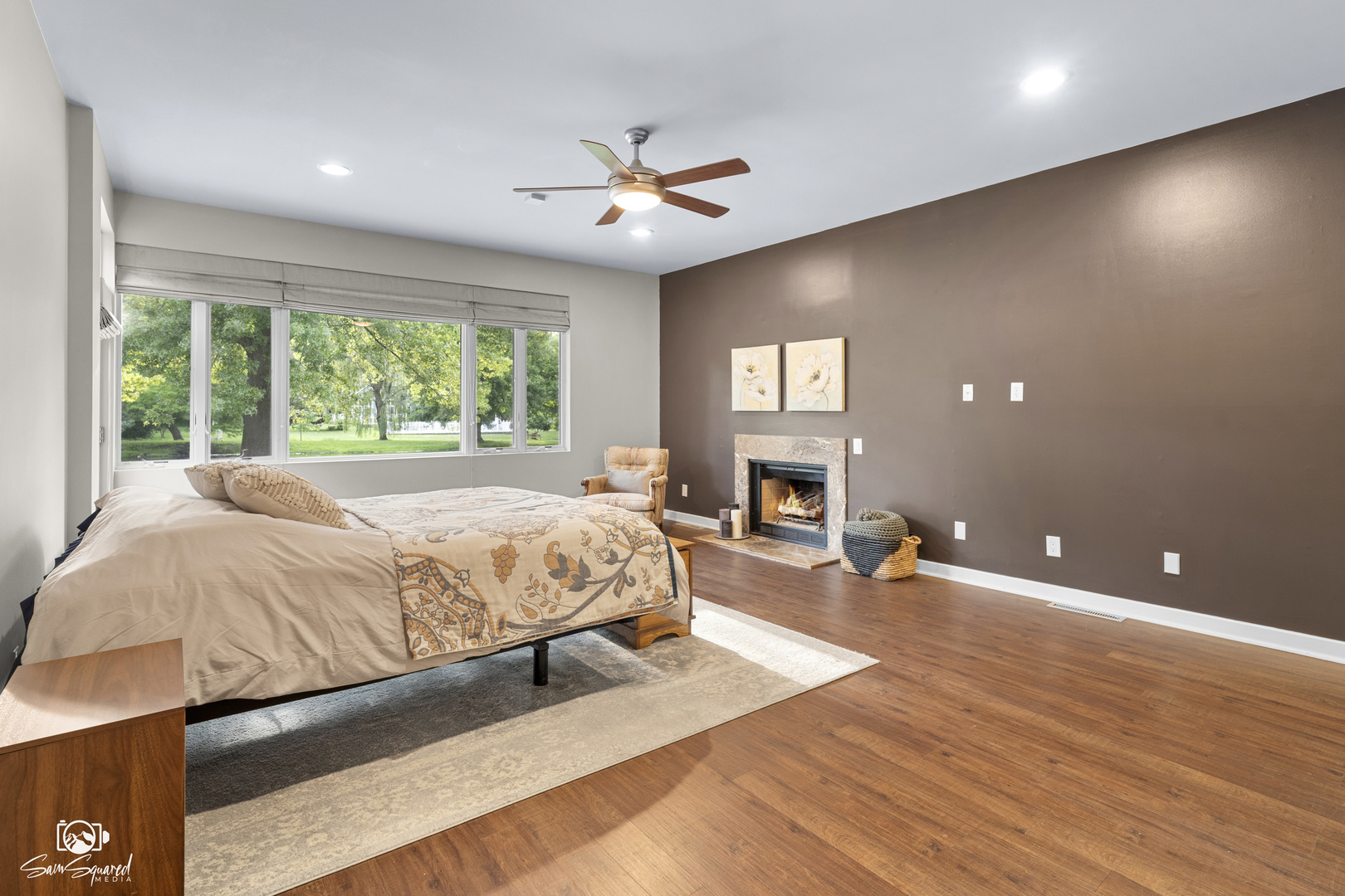 1886 Springview Drive Kankakee, IL 60901 - Photo 35 of 42 a spacious bedroom with a bed and a fireplace