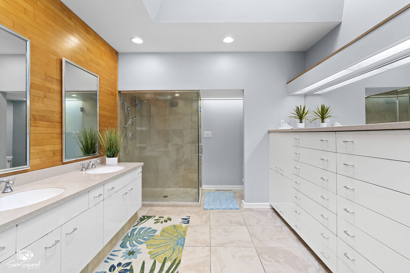 1886 Springview Drive Kankakee, IL 60901 - Photo 37 of 42 a bathroom with a double vanity sink a mirror and a shower