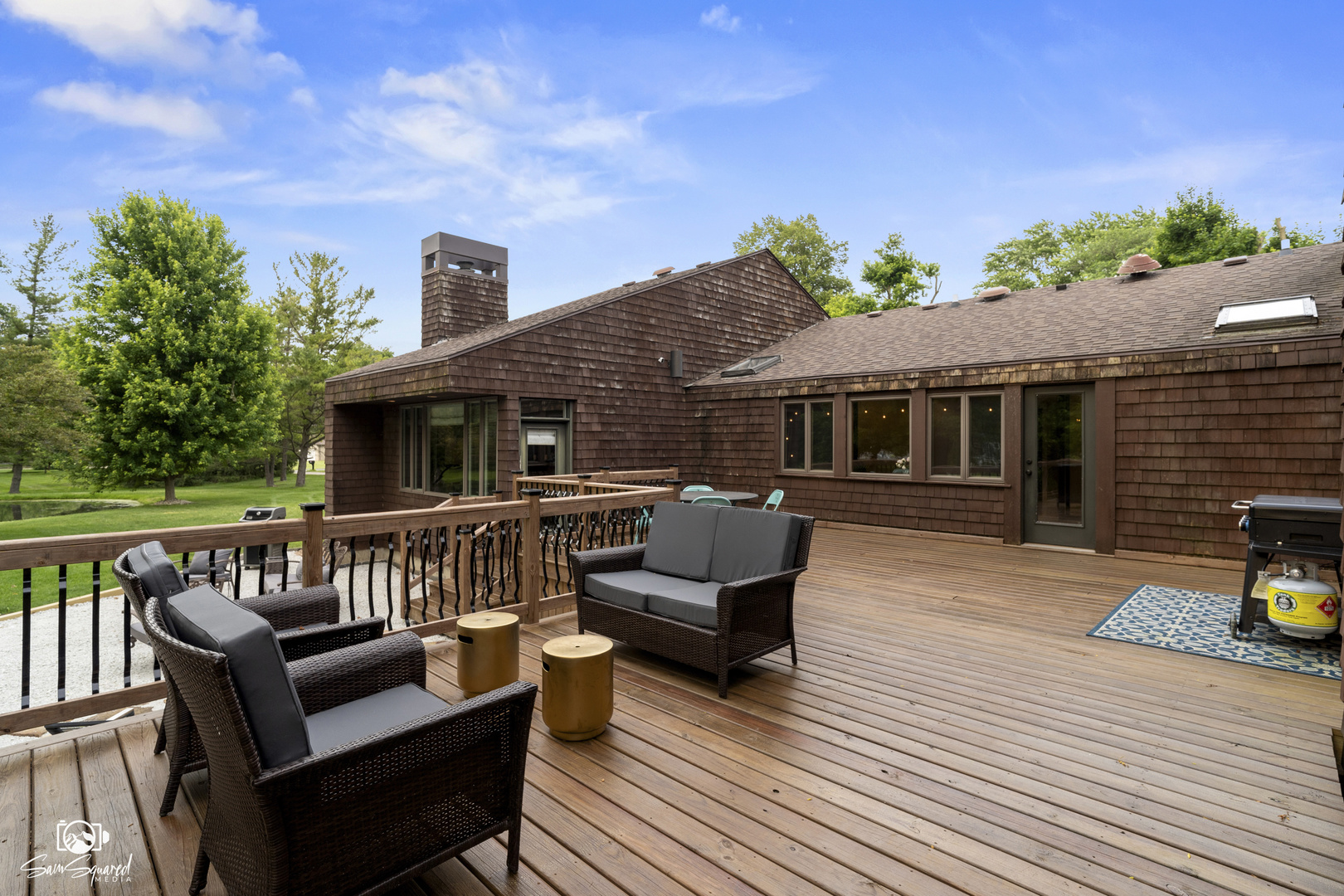 1886 Springview Drive Kankakee, IL 60901 - Photo 8 of 42 a view of a patio with couches chairs and wooden floor