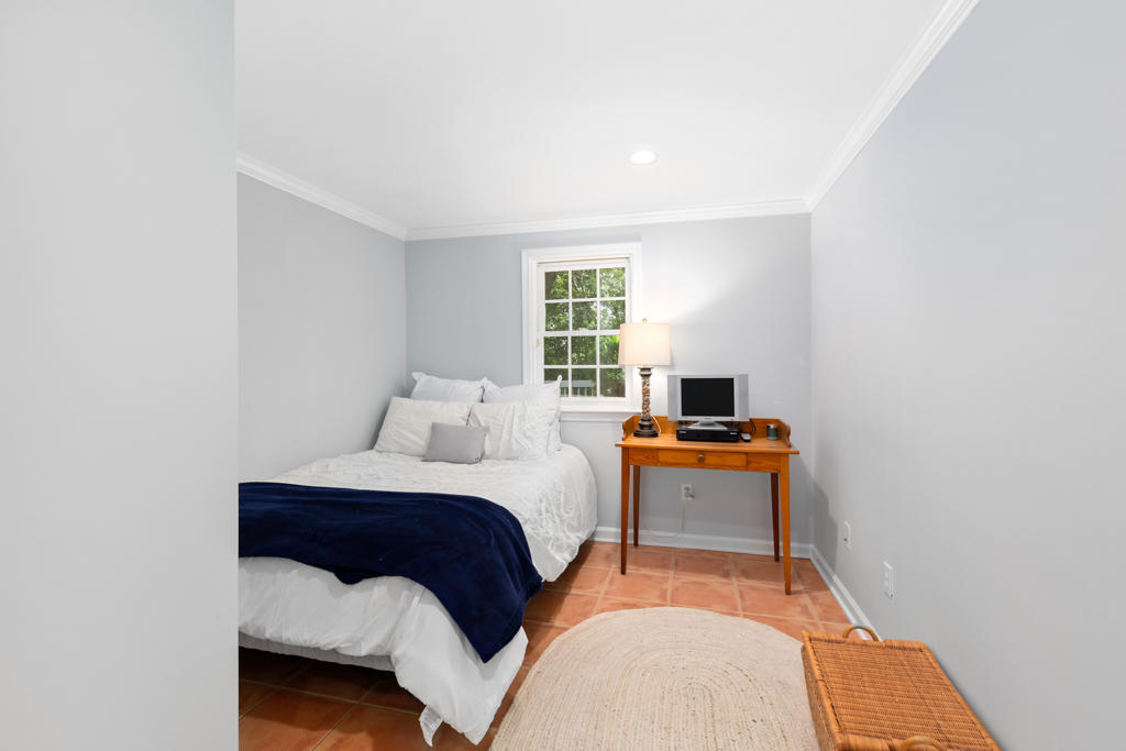 50 Stanton Road Darien, CT 06820 - Photo 22 of 30 a bedroom with a bed and a window