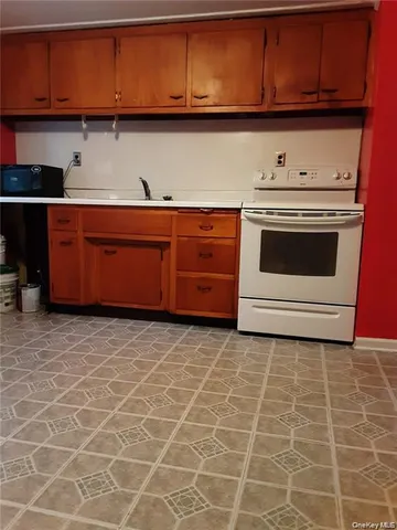 a utility room with cabinets