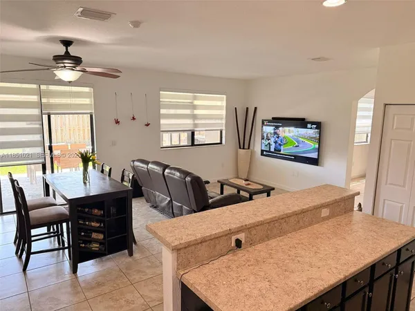 a view of a dining room with furniture