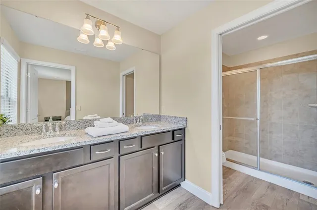 a bathroom with a shower and a toilet