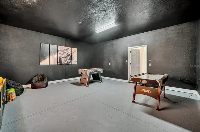 a view of indoor pool and sitting area