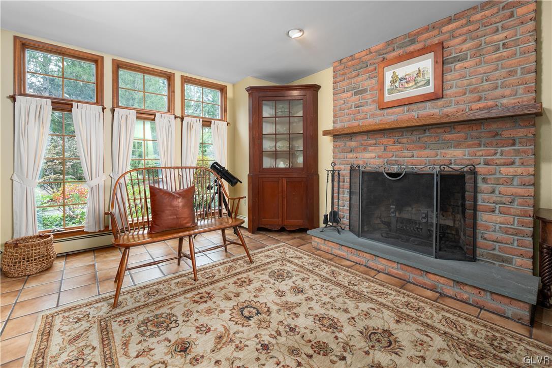 144 Devonshire Drive Stroudsburg, PA 18360 - Photo 20 of 34 a living room with furniture and a fireplace
