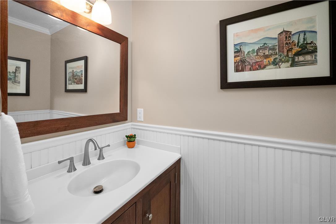 144 Devonshire Drive Stroudsburg, PA 18360 - Photo 22 of 34 a bathroom with a sink and a mirror