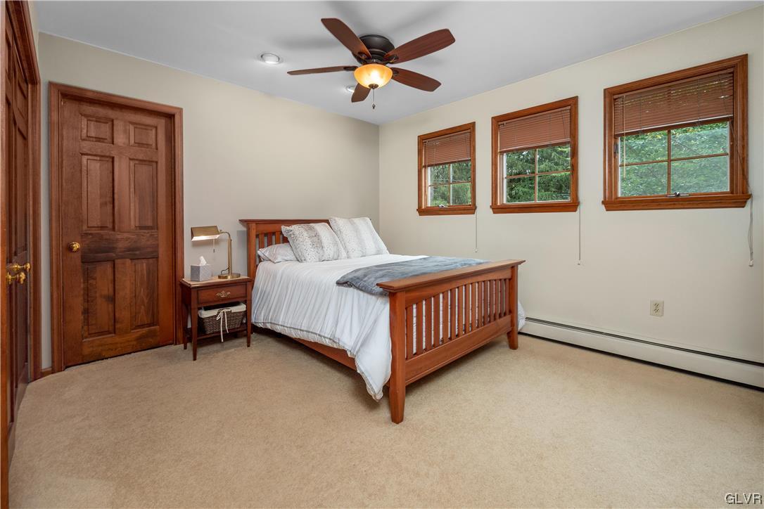144 Devonshire Drive Stroudsburg, PA 18360 - Photo 28 of 34 a bedroom with a bed and a window