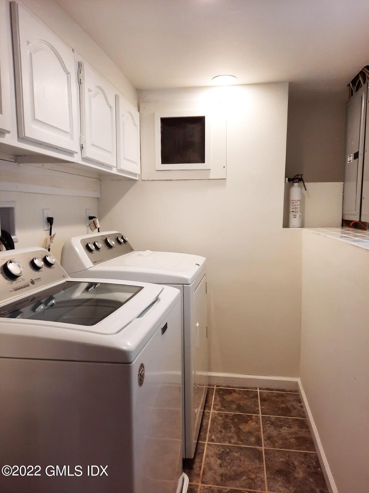 13 High Street Greenwich, CT 06830 - Photo 18 of 21 a utility room with dryer and washer