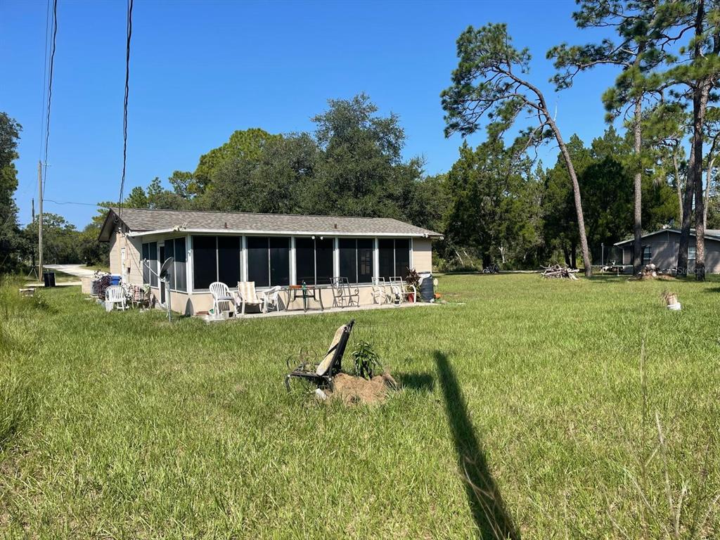 11433 South Rosewater Point Homosassa, FL 34446 - Photo 7 of 7 a view of house with a big yard