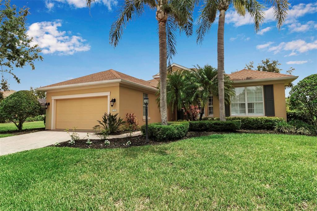 1542 Ormond Terrace Parrish, FL 34219 - Photo 1 of 1 a front view of a house with a yard and garage