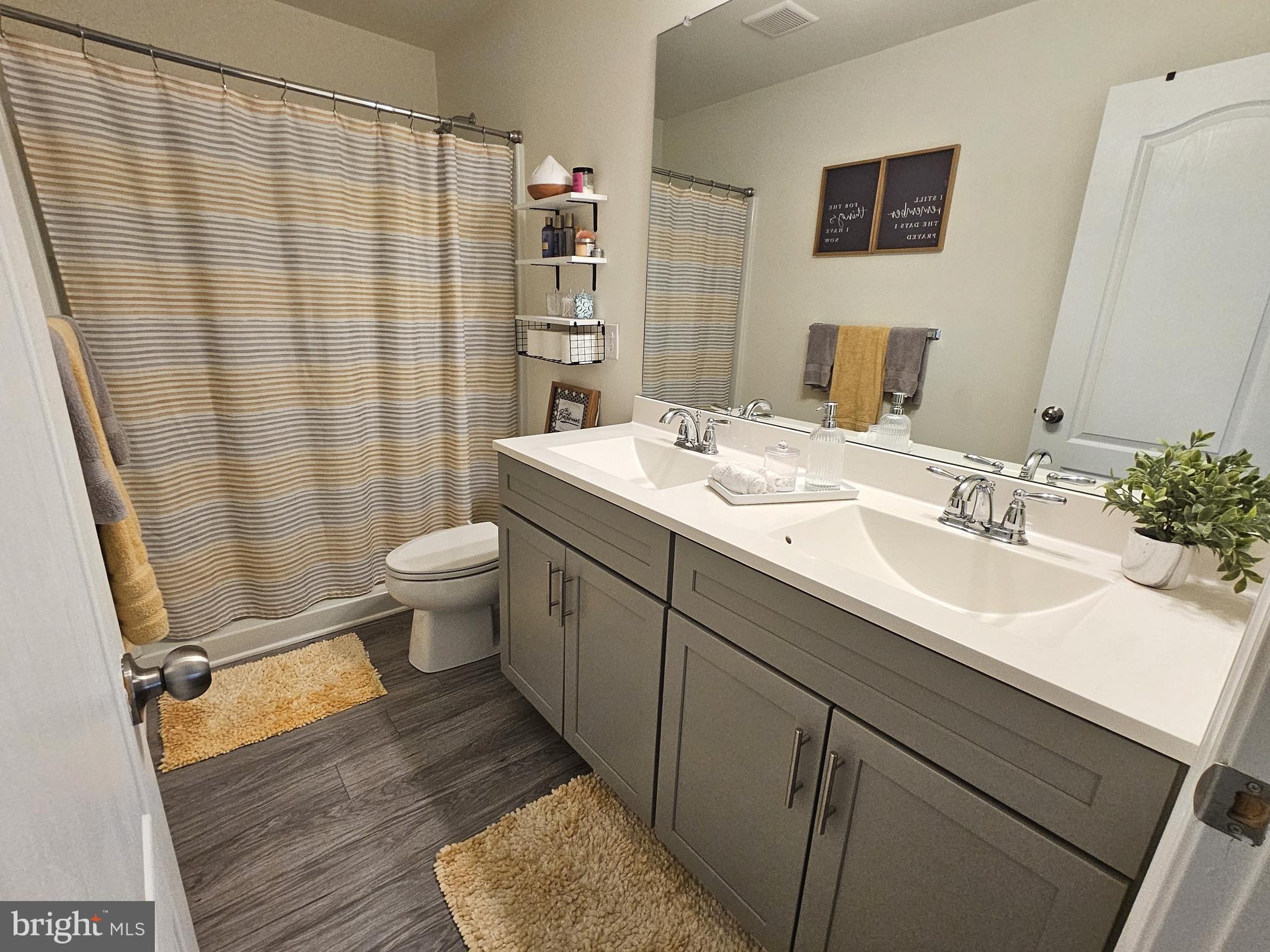 263 Tea Party Trail Dover, DE 19901 - Photo 28 of 36 a bathroom with a sink toilet and shower