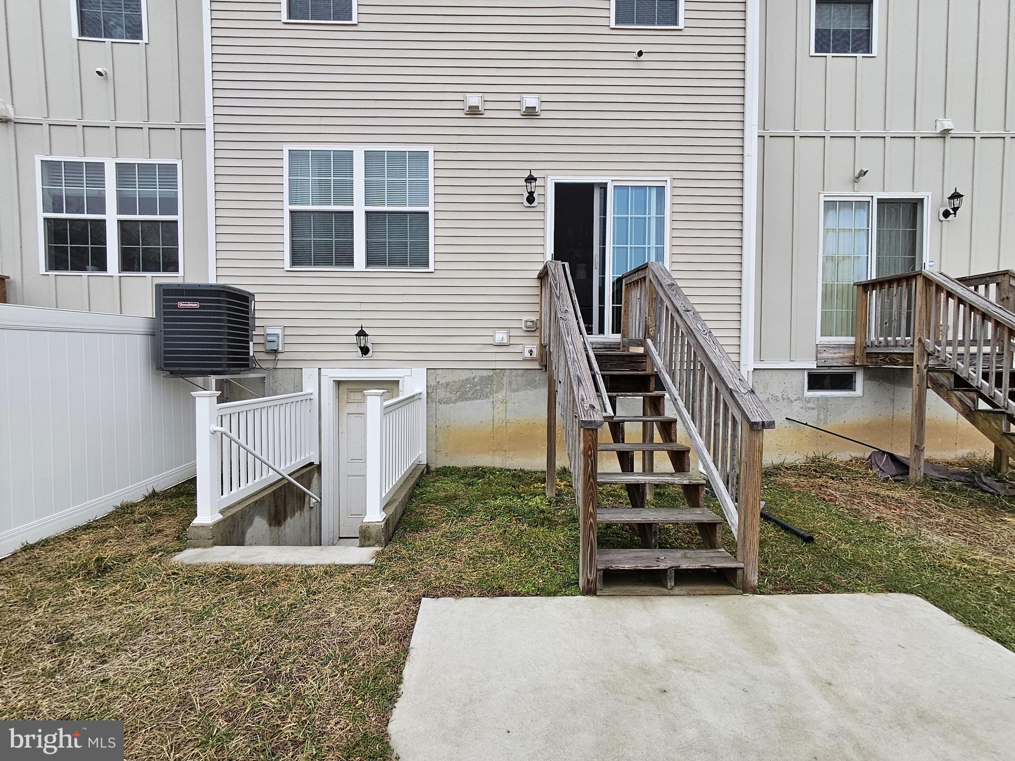 263 Tea Party Trail Dover, DE 19901 - Photo 32 of 36 a view of a house with backyard porch and wooden floor
