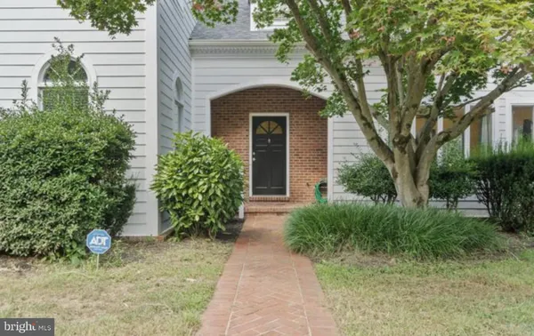 a view of a house with a big yard