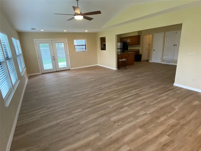 a bathroom with a glass door shower and a sink