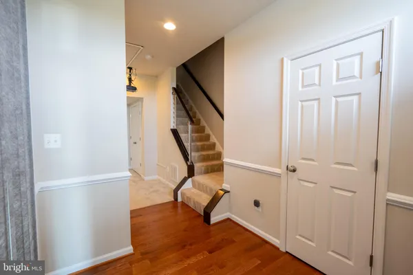 a view of entryway with wooden floor