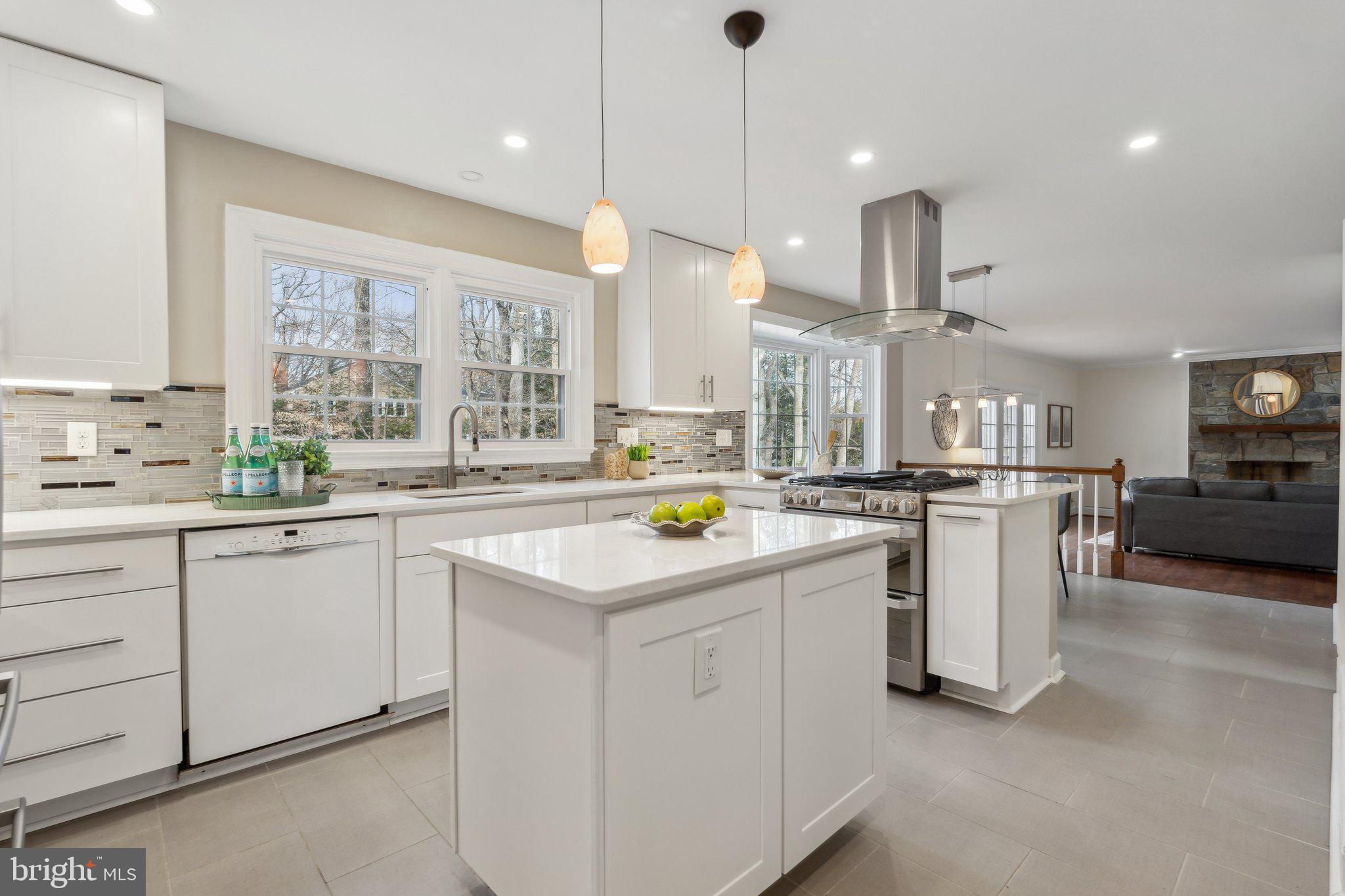 7708 Brickyard Road Potomac, MD 20854 - Photo 12 of 45 Stone counters, white cabinetry, modern appliances