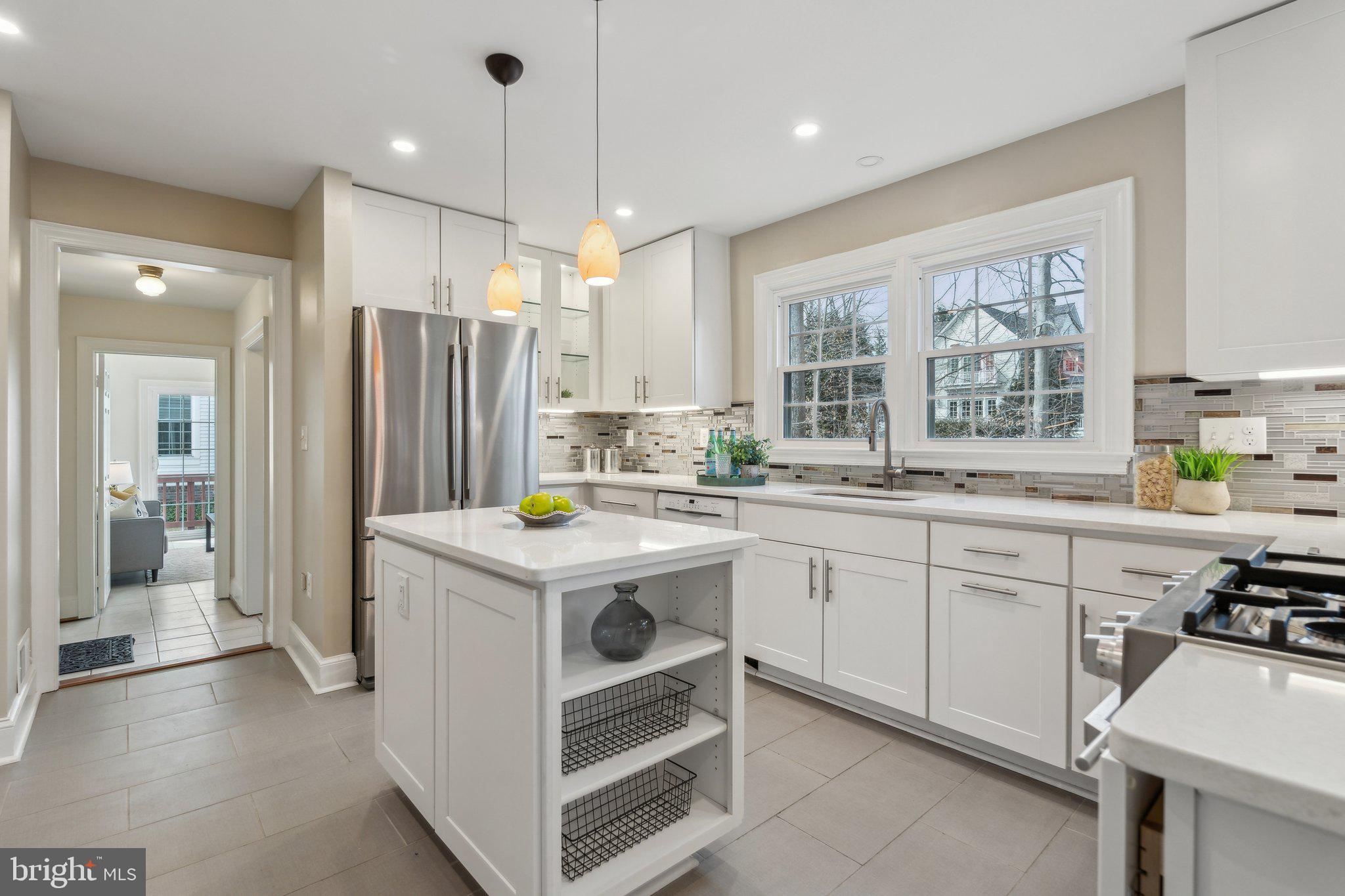 7708 Brickyard Road Potomac, MD 20854 - Photo 13 of 45 Hallway leads to sunroom, laundry, garage