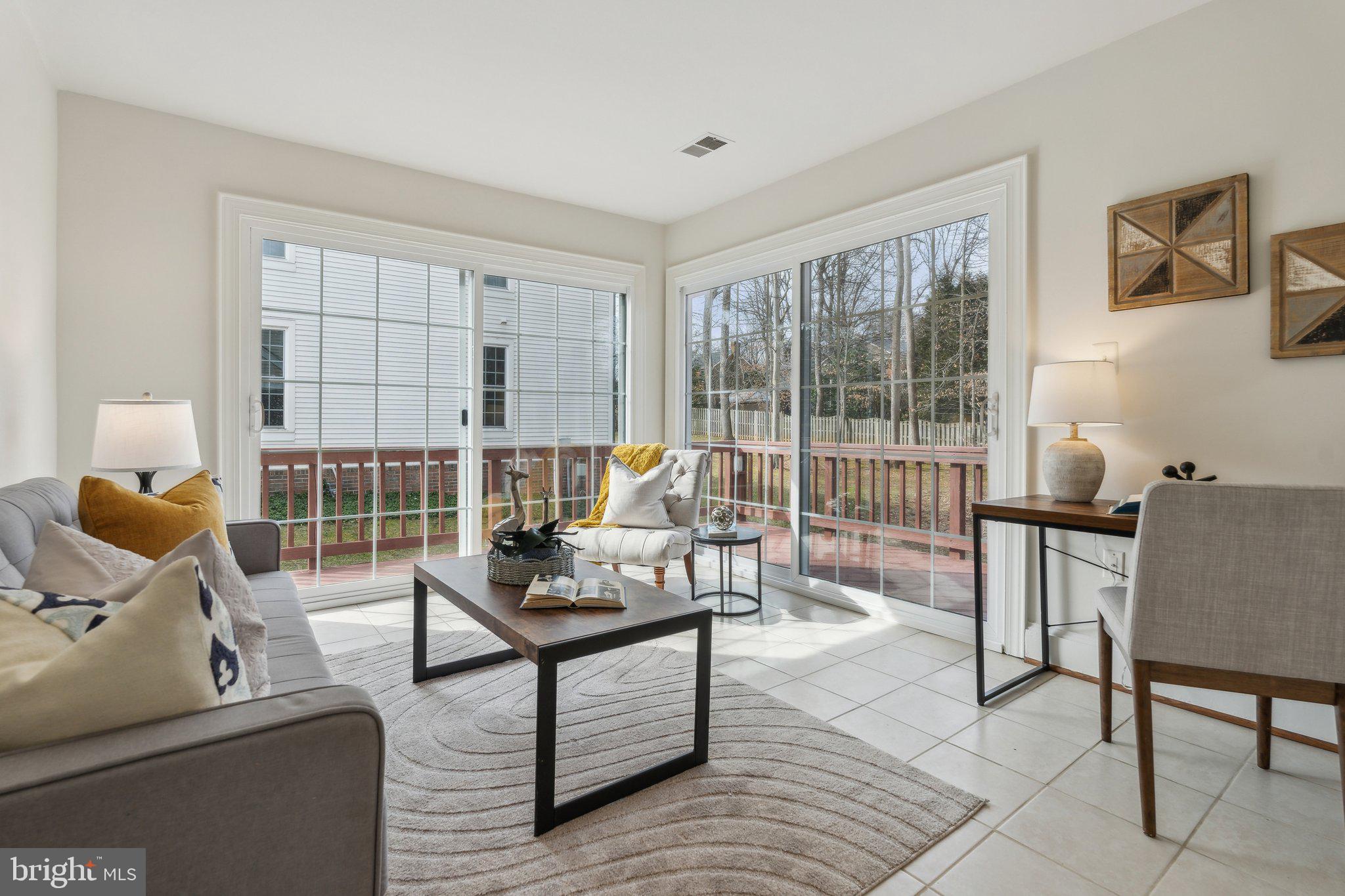 7708 Brickyard Road Potomac, MD 20854 - Photo 17 of 45 Sunroom leading to deck