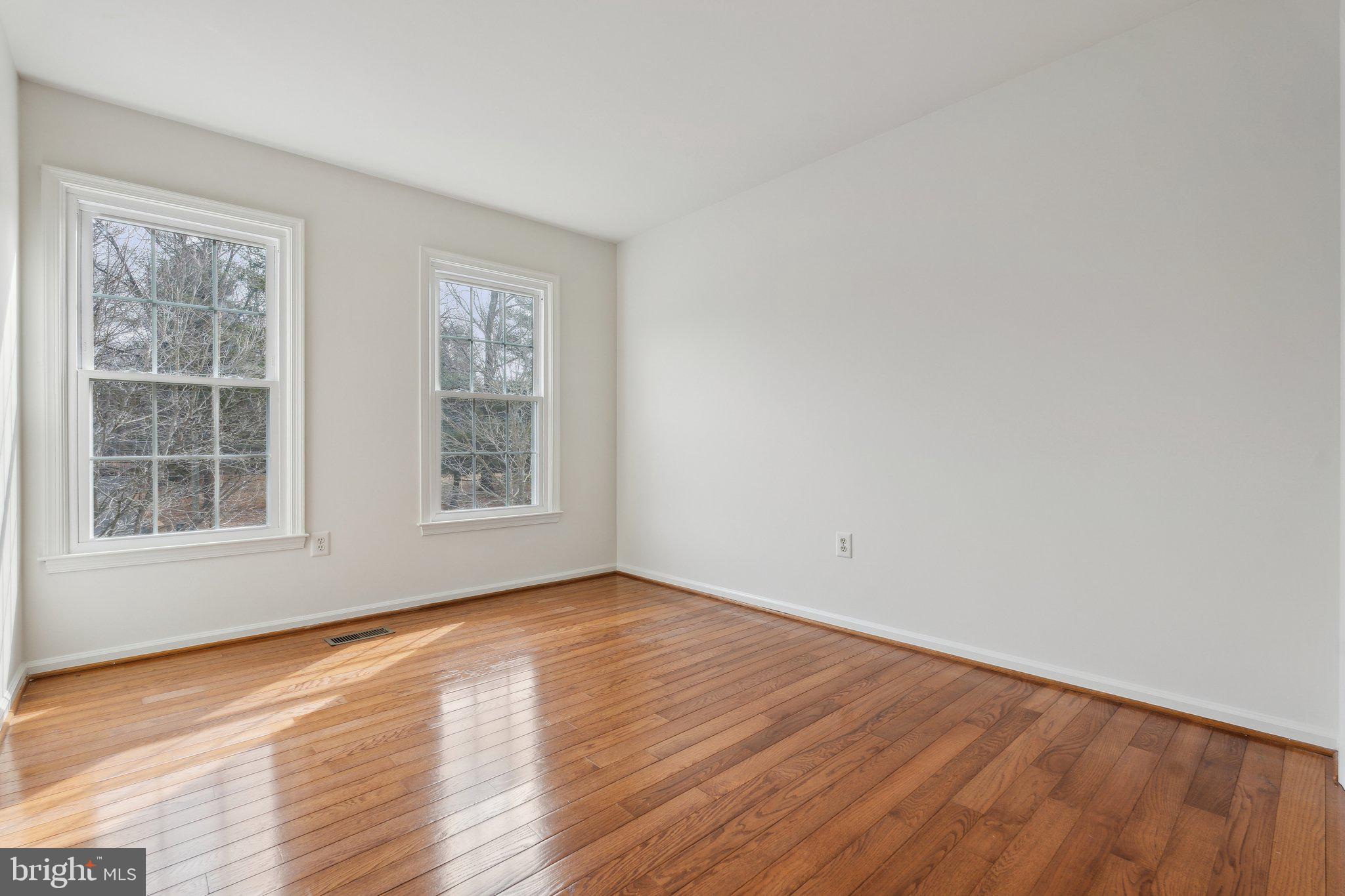 7708 Brickyard Road Potomac, MD 20854 - Photo 25 of 45 Bedroom 2 on upper level features hardwood floors