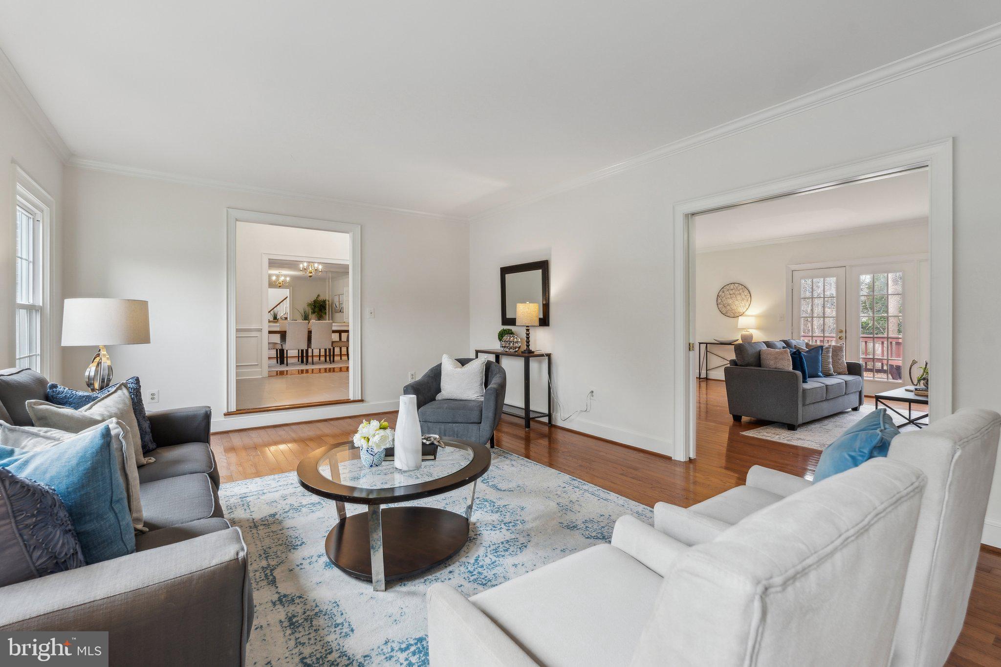 7708 Brickyard Road Potomac, MD 20854 - Photo 5 of 45 Pocket doors lead to the family room
