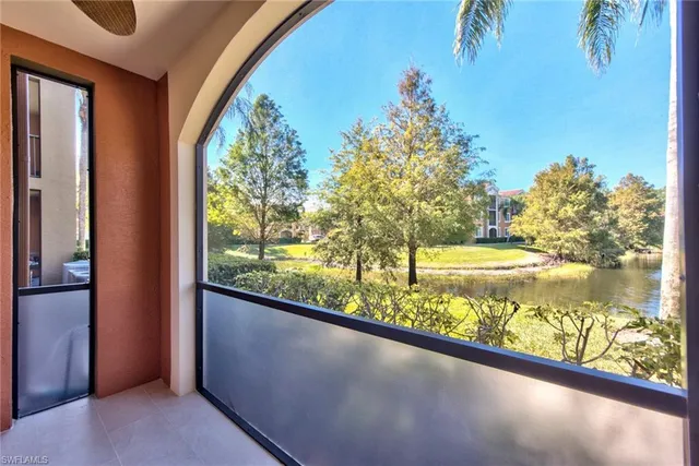a view of swimming pool from a window