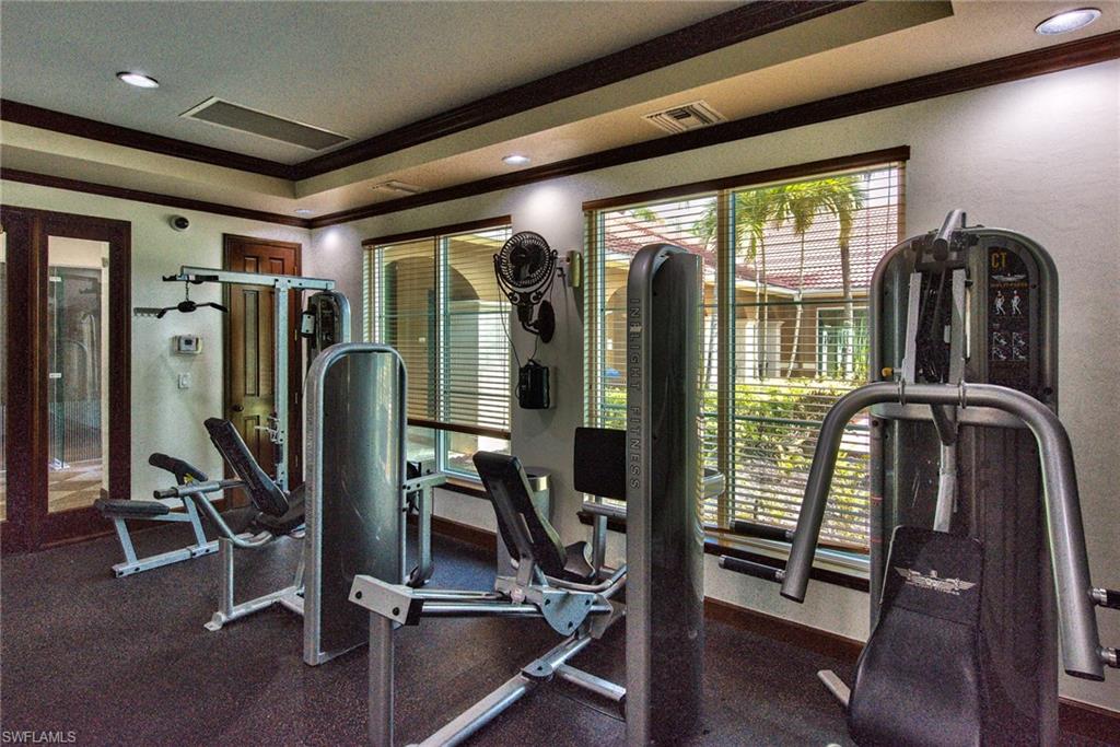 1200 Reserve Way, Unit 106 Naples, FL 34105 - Photo 27 of 31 a view of a room with gym equipment
