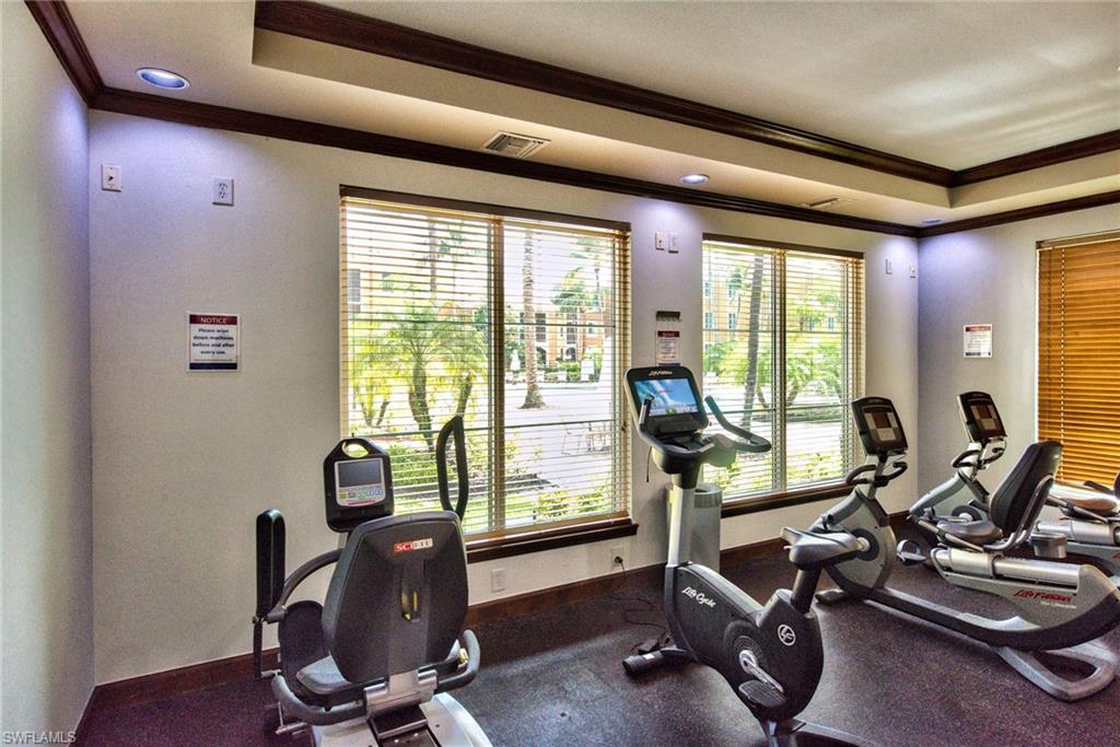 1200 Reserve Way, Unit 106 Naples, FL 34105 - Photo 28 of 31 a view of a room with gym equipment